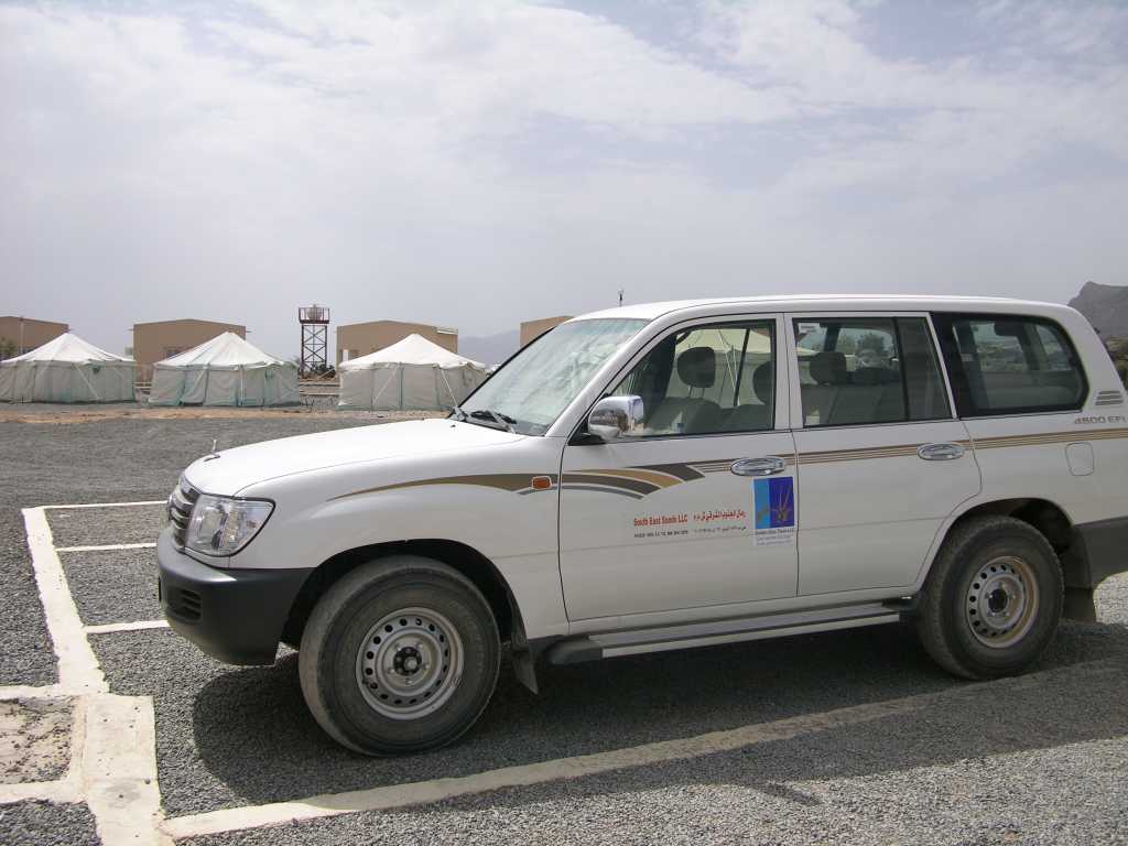 Muscat 07 12 Jebel Shams Campground And Our SUV We had a tasty lunch at the campground next to Jebel Shams and enjoyed the much more comfortable 30C temperatures. Our brand new luxurious SUV is parked behind. After lunch we enjoyed Kahwa, coffee flavoured with cardamom.